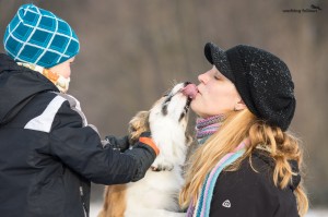 Ája, giving kisses to her breeder Alena